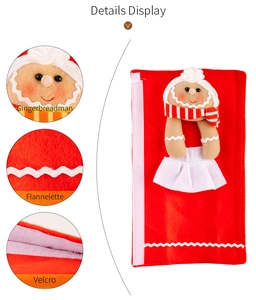 Detail of red flannelette Christmas handle cover with a plush gingerbread man and velcro