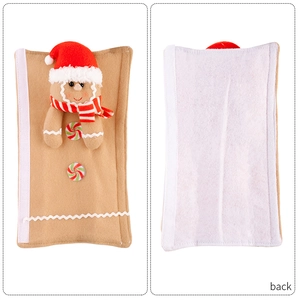 Detail of Christmas gingerbread man handle cover with festive scarf and velcro closure