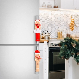 Gingerbread man refrigerator handle covers showing festive Christmas kitchen decor detail