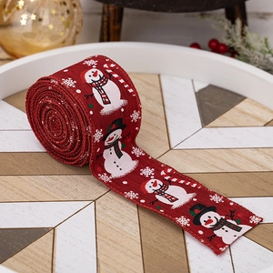 Ruban de Noël rouge avec bonshommes de neige et sucres d'orge pour décoration