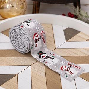 Ruban de Noël avec bonhommes de neige et sucres d'orge sur tissu gris chiné