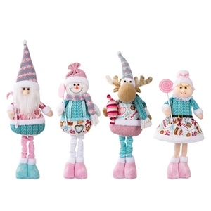 Set of four pink and blue telescopic Christmas plush figures including Santa and reindeer