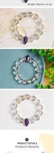 Macro detail of natural white quartz 13mm beaded bracelet with purple amethyst point