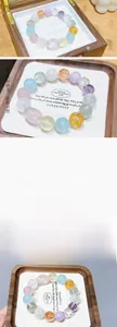 Macro detail of 12mm natural crystal beads in pastel macaron colors with size chart