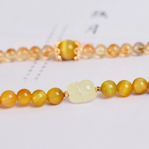 Tiger Eye beaded bracelet with Citrine and hand-carved Pixiu charm in a double layer