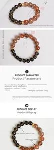 Detail of 9mm smoky quartz and 11mm black super seven crystal beads with gold spacers