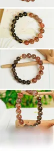 Detailed macro view of smoky quartz beads and hand-woven crystal bracelet 30g