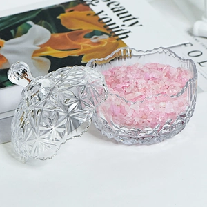 Elegante recipiente de vidrio con tapa de diamantes y piedras de cristal rosado