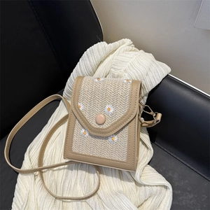 Mini woven crossbody bag with daisy embroidery and adjustable leather strap for women