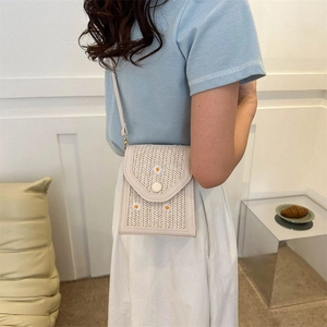 Chic beige woven crossbody bag with daisy embroidery and V-shaped straw texture
