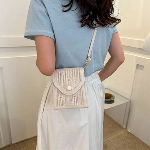 Chic woven daisy crossbody bag in cream white with a slim leather strap for summer