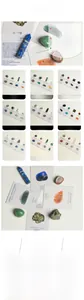 Detailed set of natural chakra crystal pillars and tumbled stones with meaning cards