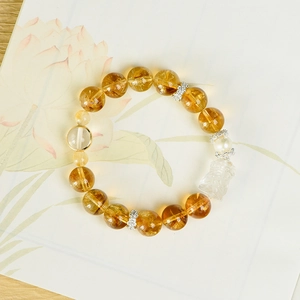 Bracciale in citrina gialla naturale con ciondolo in cristallo bianco e perle d'argento