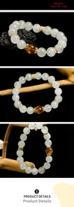 Detail of 10mm white phantom quartz bracelet with yellow crystal bead, weighing 32g
