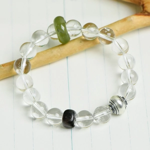 Natural white crystal 10mm beaded bracelet with green jade ring and silver spacer bead