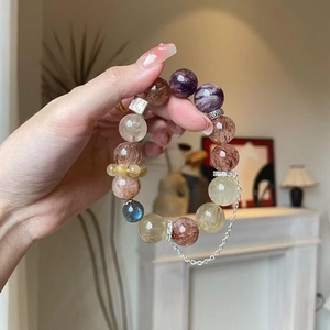 Natural multi-gemstone beaded bracelet featuring phantom quartz and silver metal accents