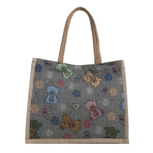 Grand sac cabas en lin avec oursons colorés et flocons sur fond gris pour le shopping