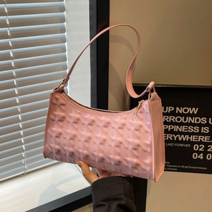 Pink star embossed hobo underarm bag with gold hardware for a modern urban look