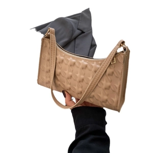Minimalist khaki underarm bag with quilted star pattern and gold zipper for women