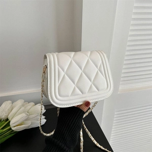 White quilted faux leather crossbody bag with golden chain strap and flap closure