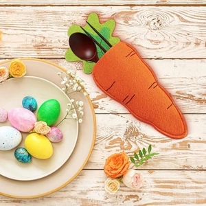 Carrot-shaped felt cutlery holder for Easter table decor with green leaves detail
