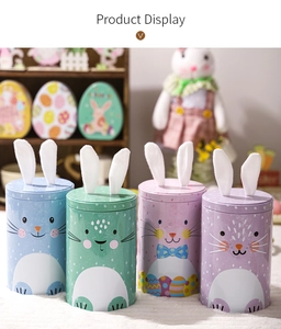 Macro view of pastel Easter bunny tin jars with plush ears and colorful egg patterns