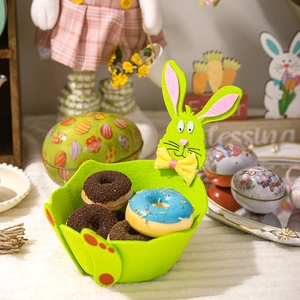 Green felt Easter bunny basket with rabbit ears detail for candy storage and decor