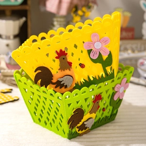 Detail of felt Easter baskets with cutout mesh and colorful rooster and flower patterns