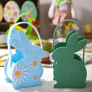 Detail of light blue felt Easter bunny basket with daisy prints and durable handles