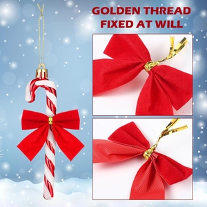 Christmas candy cane door hanger with red bow and golden hanging thread ornament