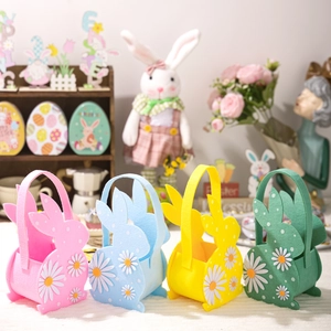 Felt Easter bunny gift baskets in pink, blue, yellow, and green with daisy floral detail