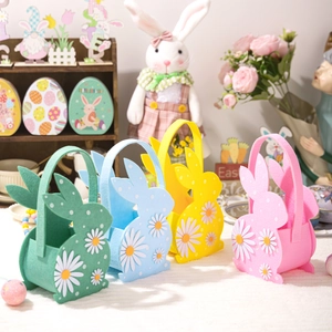 Felt Easter bunny gift baskets in pastel colors with daisy patterns and white polka dots