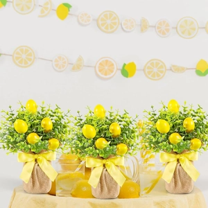 Three artificial lemon potted plants with burlap bases and yellow bows for home decor