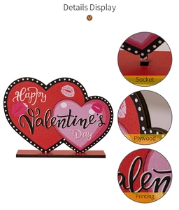 Detail of wooden Valentine's heart ornament showing slot assembly and plywood texture