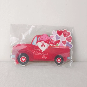 Detail of wooden Valentine's truck plaque with gnomes and Love You festive message