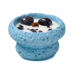 Aquarius zodiac scented candle with purple amethyst crystals and blue rock base