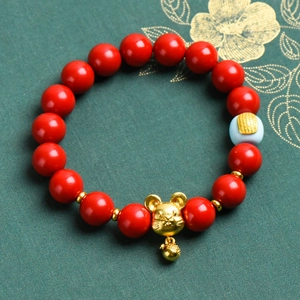 Traditional cinnabar red beaded bracelet with a golden zodiac rat charm and blue bead