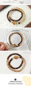 Detail view of 6.5mm tiger eye and rutilated quartz beads with 25g weight specification