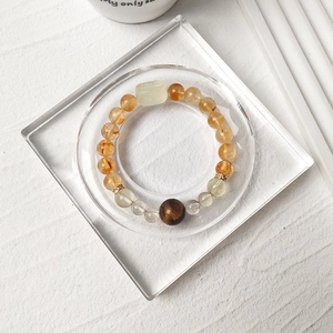 Natural yellow citrine and tiger eye bead bracelet with jade charm and gold spacers