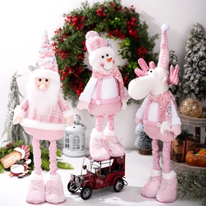 Pink and white Christmas plush figurines set including Santa, snowman and reindeer decor