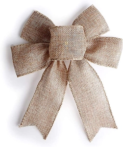 Detailed view of handmade burlap decorative bow with rustic fiber texture and dovetail tails