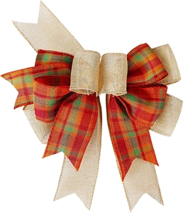 Detailed texture of rustic burlap Christmas bow with red and green plaid patterns