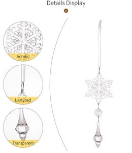 Detailed display of transparent acrylic snowflake pendant with beads and hanging lanyard