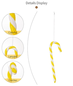 Detail display of yellow and white candy cane ornament with spiral texture and lanyard