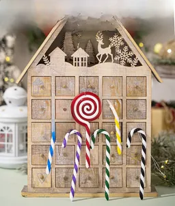 Close-up of colorful spiral lollipop and candy cane Christmas tree hanging ornaments