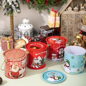 Boîte de rangement de Noël ronde en fer avec poignée et motifs festifs de Père Noël