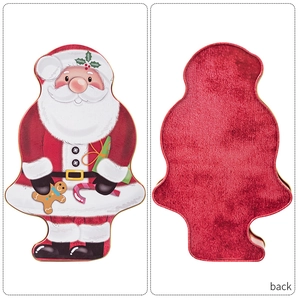 Front and back view of a Santa-shaped tin box with gingerbread and candy cane motifs