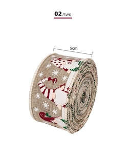 Close-up of 5cm Christmas gnome and snowflake printed burlap ribbon with wired edge
