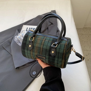 Green plaid wool Boston handbag with black leather straps and gold metal hardware