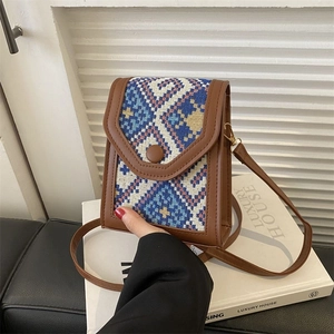 Retro geometric woven crossbody phone bag with brown leather trim and flap closure